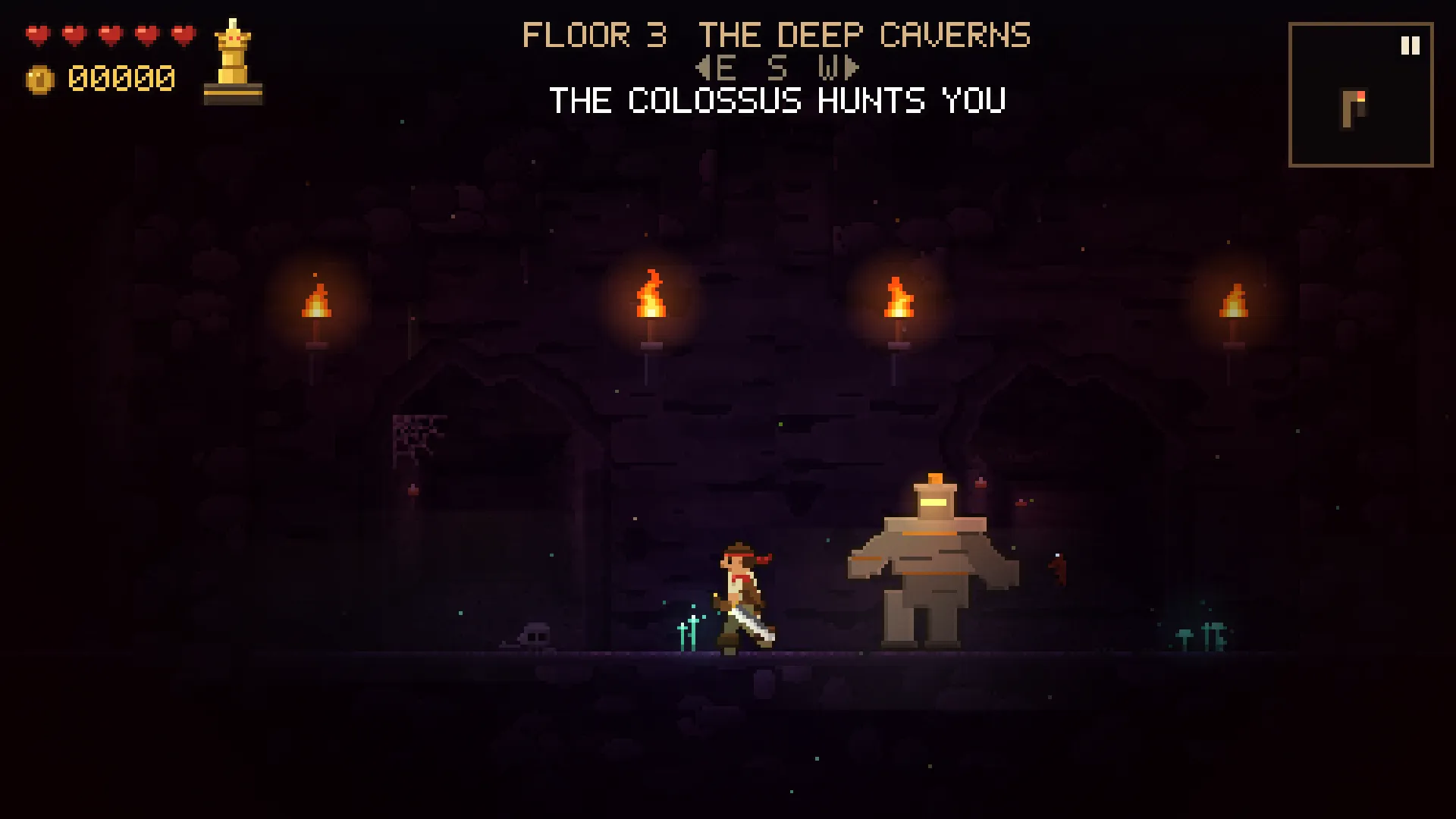 Floor 3, the Deep Caverns: the colossus hunts the explorer under a row of torches
